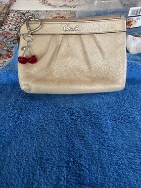 Coach Gold Pebbled Leather Wristlet with Cherry Charm